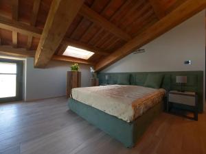 Łóżko lub łóżka w pokoju w obiekcie Relais Colle Messino Briaglia Mondovì