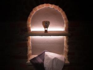 Łóżko lub łóżka w pokoju w obiekcie Relais Colle Messino Briaglia Mondovì
