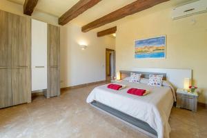 Postel nebo postele na pokoji v ubytování Tfiefa Holiday Home + 12 fotografií