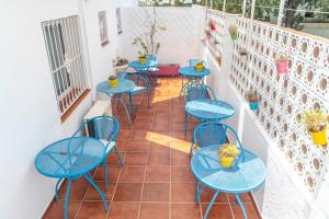 Reštaurácia alebo iné gastronomické zariadenie v ubytovaní La Moraga de Poniente Malaga Hostel