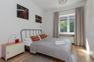 Posteľ alebo postele v izbe v ubytovaní Apartment Bialobrzeska Warsaw by Noclegi Renters
