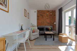 Posedenie v ubytovaní Apartment Bialobrzeska Warsaw by Noclegi Renters