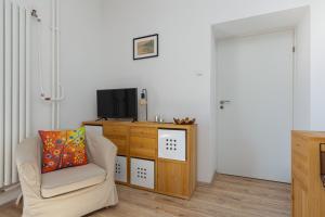 Televízia a/alebo spoločenská miestnosť v ubytovaní Apartment Bialobrzeska Warsaw by Noclegi Renters + 13 fotografií