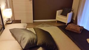 Voodi või voodid majutusasutuse B&B Aria d'Argento & Relax Home toas