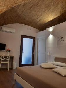 Voodi või voodid majutusasutuse Dimora Donna Dora - Albergo Diffuso toas