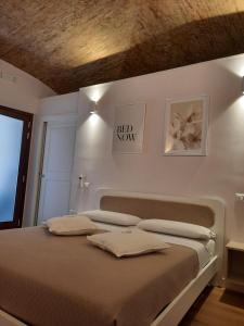 Voodi või voodid majutusasutuse Dimora Donna Dora - Albergo Diffuso toas