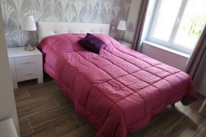 Posteľ alebo postele v izbe v ubytovaní Le Sophora