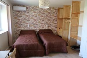 a bedroom with a bed in a room at Le Sophora in Chéu +29 photos