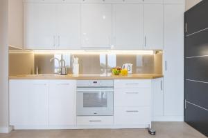 Kuchyňa alebo kuchynka v ubytovaní Apartament Plaża