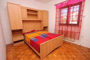 Katil atau katil-katil dalam bilik di Apartments with parking space Medulin - 7208