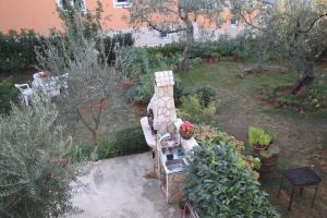Vonkajšia záhrada v ubytovaní Apartment Fazana 7284c