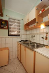 Fotografia z galérie ubytovania Apartments for families with children Fazana - 7255 v destinácii Marana