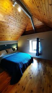 Postel nebo postele na pokoji v ubytování Gîte rural Hubermont & Merveilles