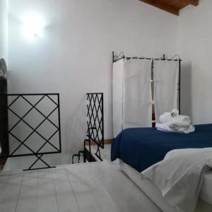 Postel nebo postele na pokoji v ubytování Casa Chiara