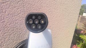 a security camera attached to a wall at Tous à l'ouest in Combrit