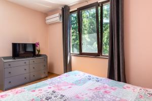 A bed or beds in a room at Bendida Park