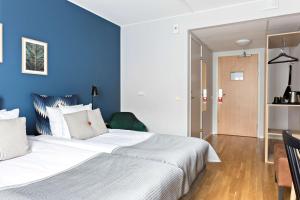 Postel nebo postele na pokoji v ubytování Best Western Hotel Park Astoria