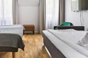 Postel nebo postele na pokoji v ubytování Best Western Hotel Park Astoria