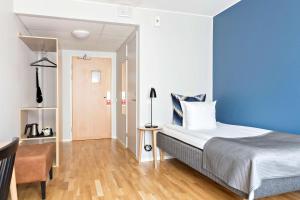 Postel nebo postele na pokoji v ubytování Best Western Hotel Park Astoria