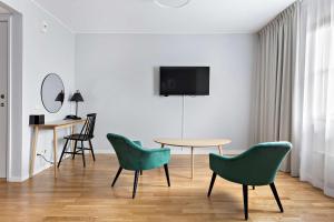 TV a/nebo společenská místnost v ubytování Best Western Hotel Park Astoria
