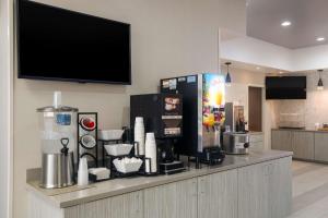 a counter in a kitchen with a counter top with a food appliance at Best Western Colfax in Colfax