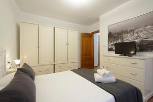 Posteľ alebo postele v izbe v ubytovaní Apartamento Concepción Granada Centro