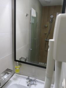 Koupelna v ubytování Hotel MEDITERRANEO