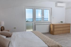 Letto o letti in una camera di The View Split. Highlight with Roof-Top-Terrace and Pool