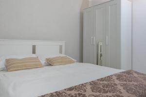 Letto o letti in una camera di The View Split. Highlight with Roof-Top-Terrace and Pool
