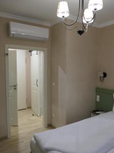 Postel nebo postele na pokoji v ubytování Hotel MEDITERRANEO