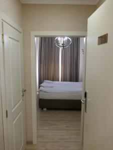 Postel nebo postele na pokoji v ubytování Hotel MEDITERRANEO