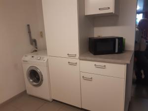 Kuchyň nebo kuchyňský kout v ubytování Gîte des Marais