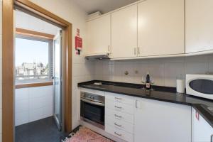 Køkken eller tekøkken på Boavista Boho Apartment w/ Garage