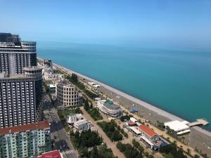 an overhead view of a city with a road and buildings at Batumi OrbiCity apart in Batumi