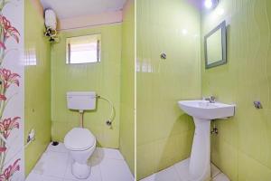 Et badeværelse på Goroomgo Elite Stay Salt Lake Kolkata Near Metro Station