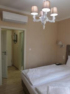 Postel nebo postele na pokoji v ubytování Hotel MEDITERRANEO