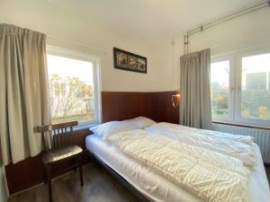 Ένα ή περισσότερα κρεβάτια σε δωμάτιο στο Lepelaarsweg 7