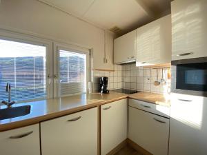 Η κουζίνα ή μικρή κουζίνα στο Lepelaarsweg 7