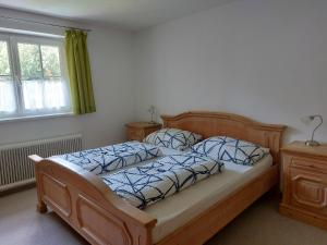 Postel nebo postele na pokoji v ubytování Grimmingapartment Maier