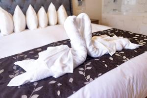 Postel nebo postele na pokoji v ubytování Casona Plaza Hotel Cusco