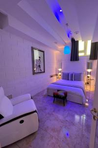 Postel nebo postele na pokoji v ubytování GianLuis Luxury Suites + 24 fotografií