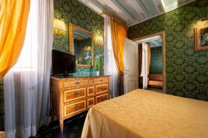 Postel nebo postele na pokoji v ubytování Hotel Santa Marina + 37 fotografií