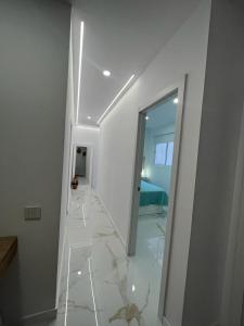 Posteľ alebo postele v izbe v ubytovaní Apartamento Casa Blanca