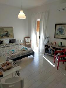 Ένα ή περισσότερα κρεβάτια σε δωμάτιο στο New Flat in the Heart of Pozzuoli