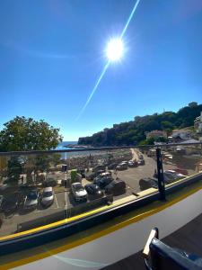 a view of a parking lot with cars parked at Marinus Hotel in Ulcinj