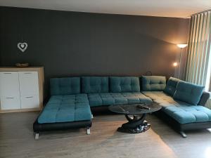 Ein Sitzbereich in der Unterkunft Landhaus Dahlem