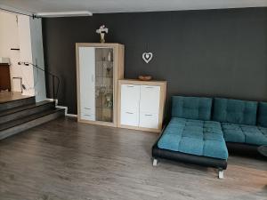 Ein Sitzbereich in der Unterkunft Landhaus Dahlem
