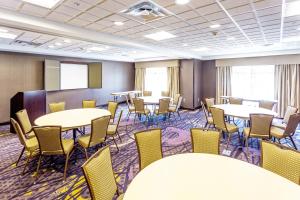 a conference room with tables and chairs in it at Holiday Inn Express Hotel & Suites Billings, an IHG Hotel in Billings