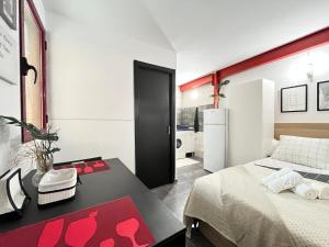 Postel nebo postele na pokoji v ubytování Estudio Caravaca Temporal