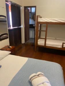 Postel nebo postele na pokoji v ubytování Pousada Luar do Prata
